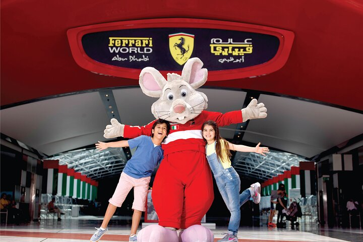 Experience excitement at Ferrari World in Abu Dhabi where animated characters welcome guests and anticipation builds for unforgettable rides and immersive Italian-themed attractions. Perfect for family fun!